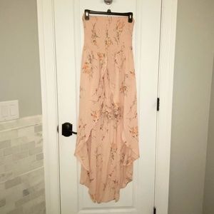 Strapless romper with flowy back. Worn once.